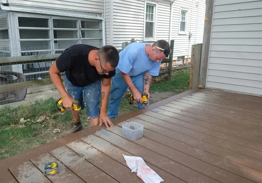 Professionals ensuring precise deck assembly, a hallmark of Deck builders Central Otago at Builders Central Otago.