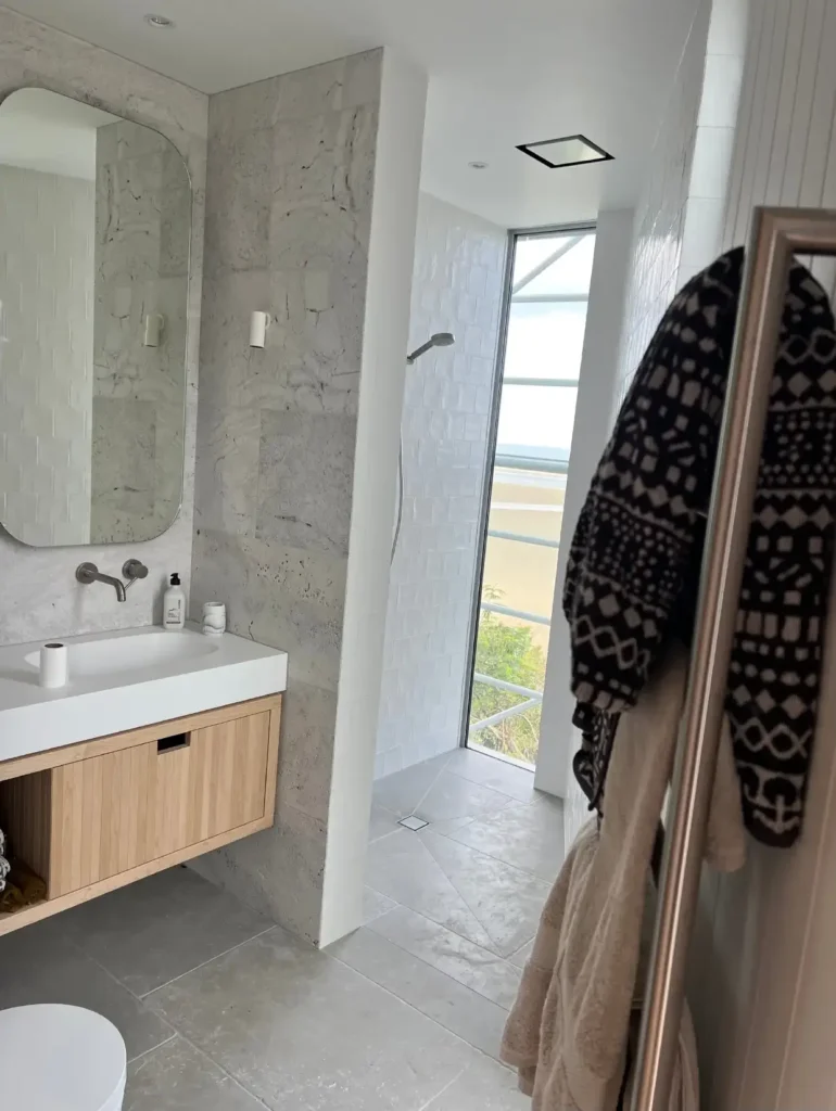 Modern bathroom renovation with glass shower doors and sleek fixtures by Bathroom Renovations Central Otago.